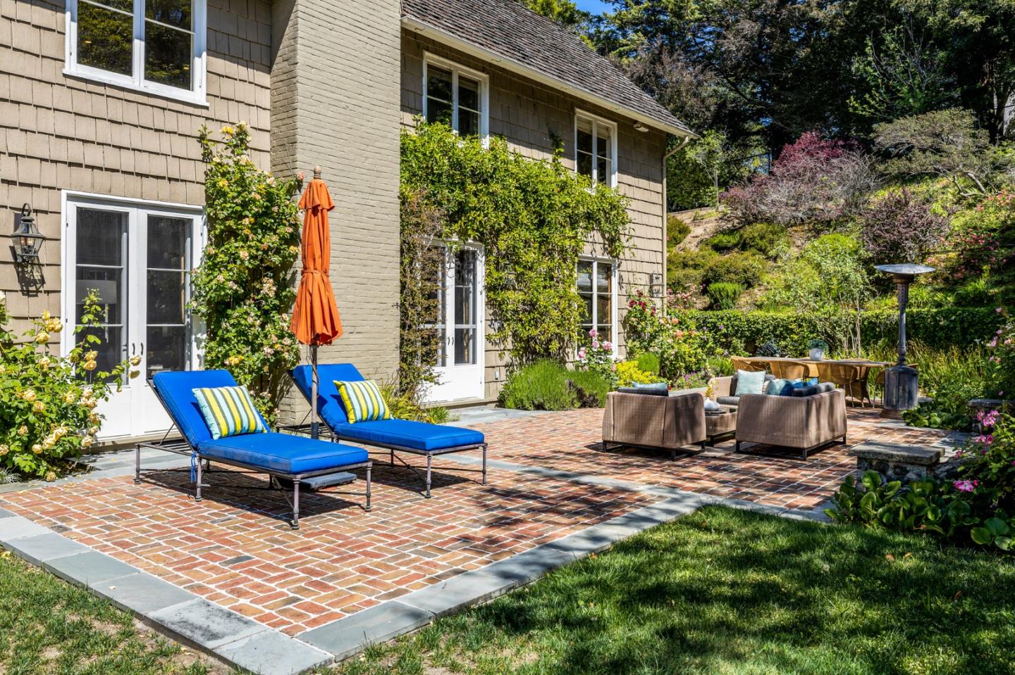 989 Hayne Road Hillsborough, CA 94010 - Photo 96 of 100 a view of a chair and table in backyard of the house