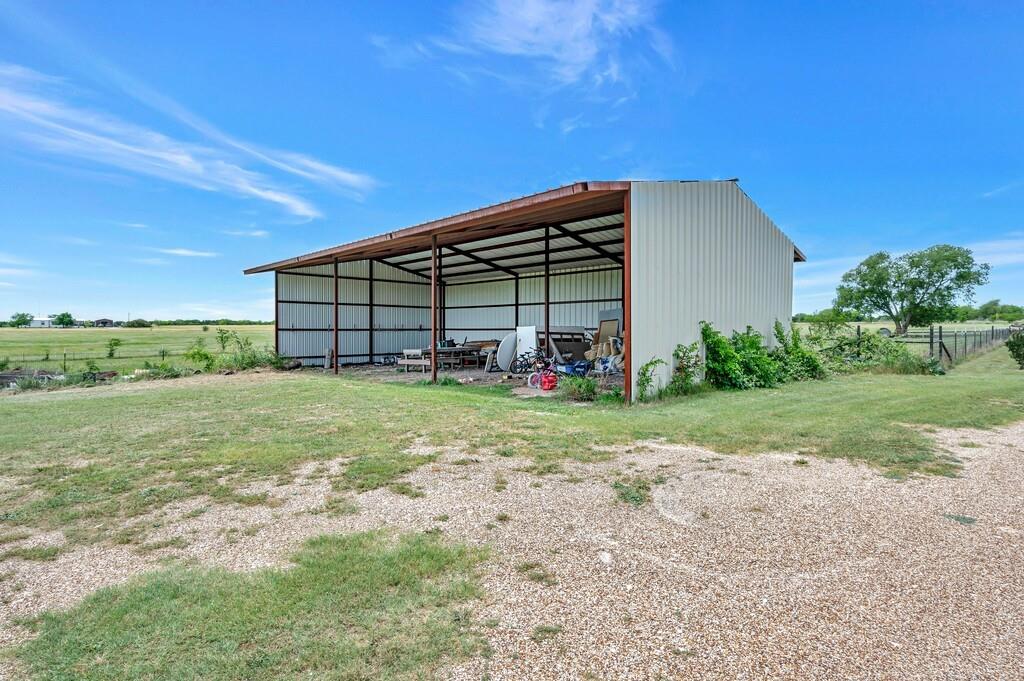 355 Highway 236 Moody, TX 76557 - Photo 33 of 36 View of pole building featuring a carport