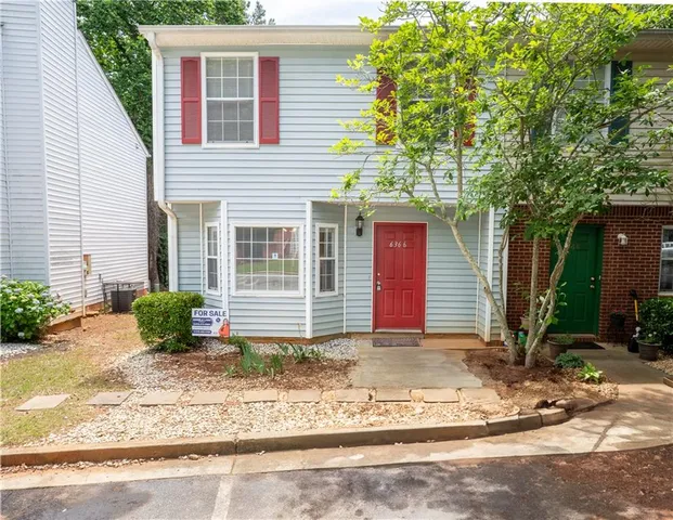 a view of a house with a patio