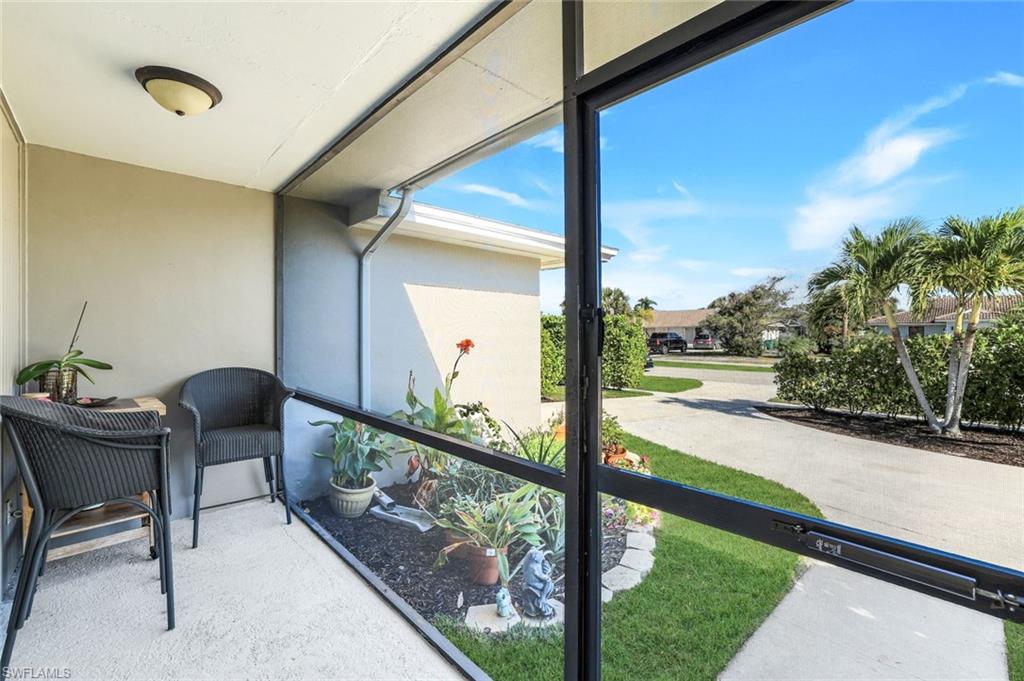1237 Jamaica Road Marco Island, FL 34145 - Photo 5 of 26 a view of a porch