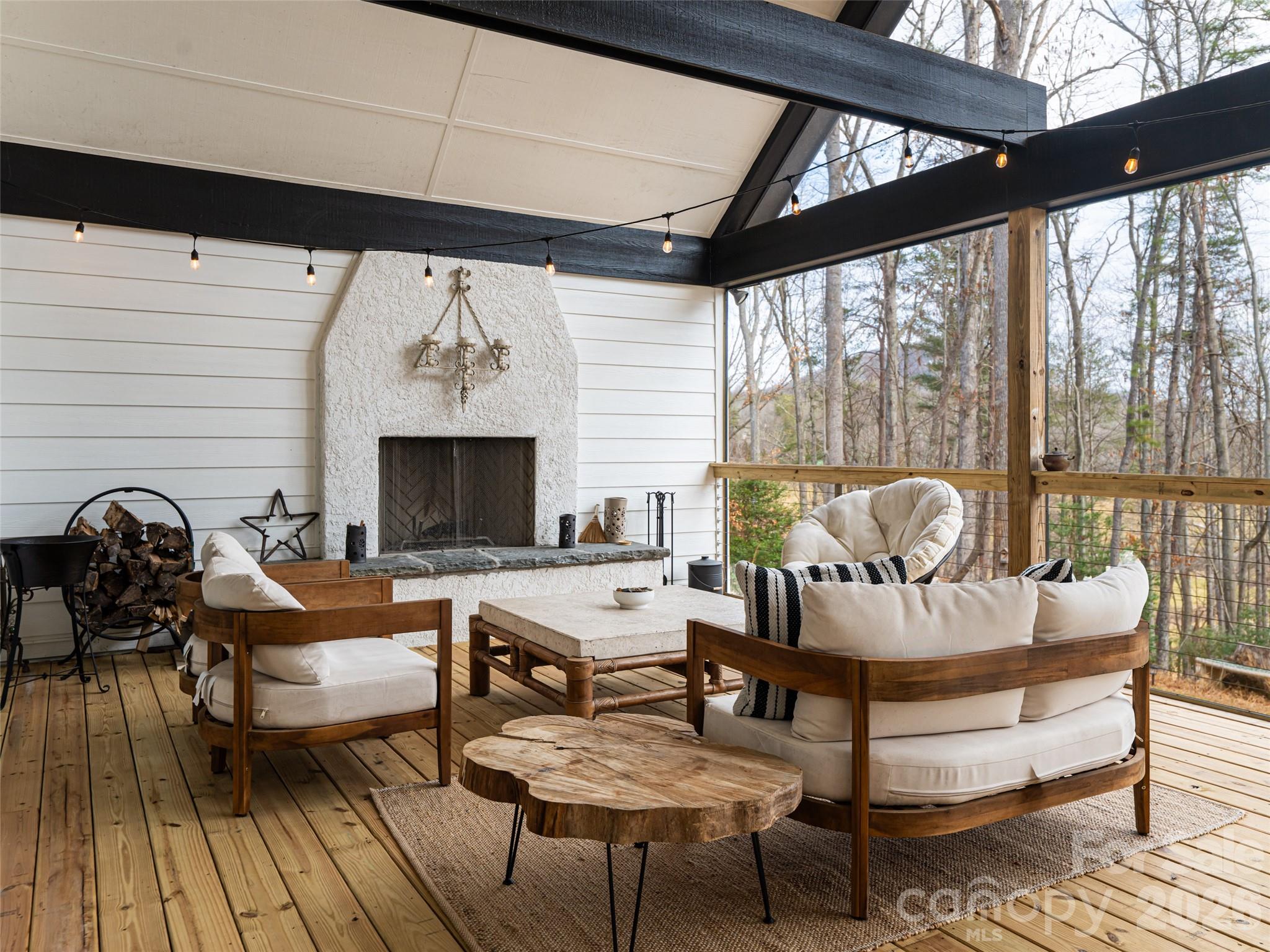 508 Avery Creek Road Arden, NC 28704 - Photo 11 of 47 a living room with furniture and a fireplace