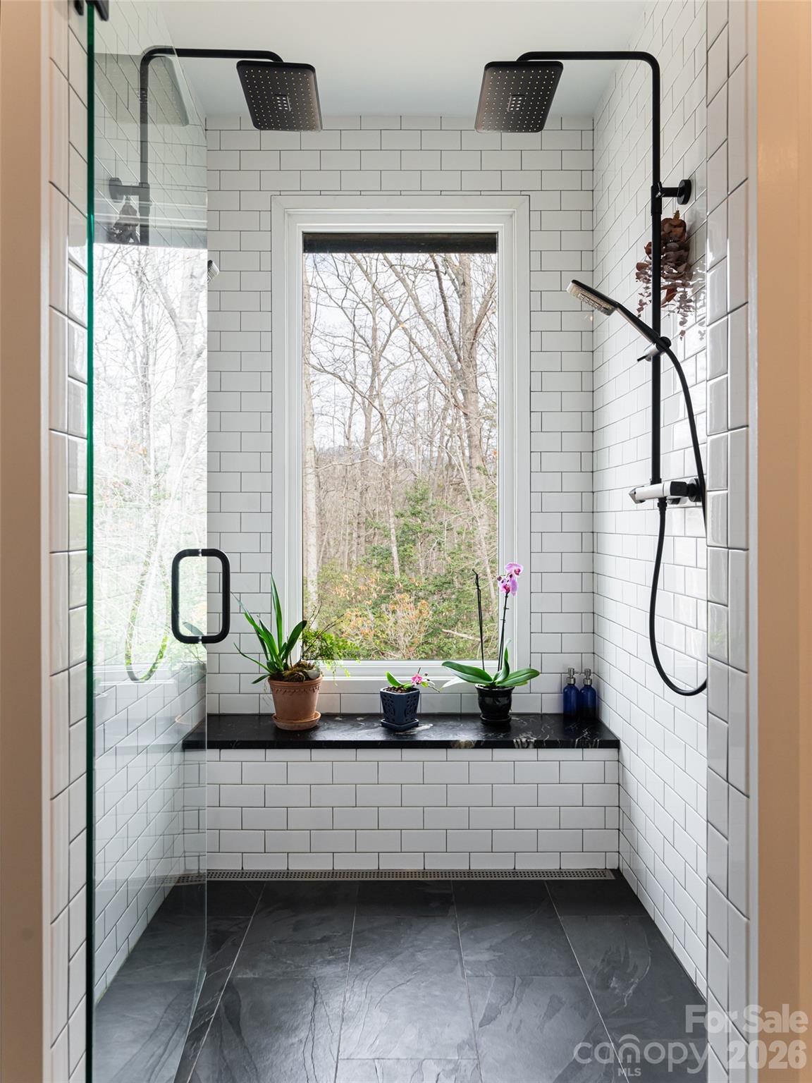 508 Avery Creek Road Arden, NC 28704 - Photo 15 of 47 a bathroom with a tub sink and mirror