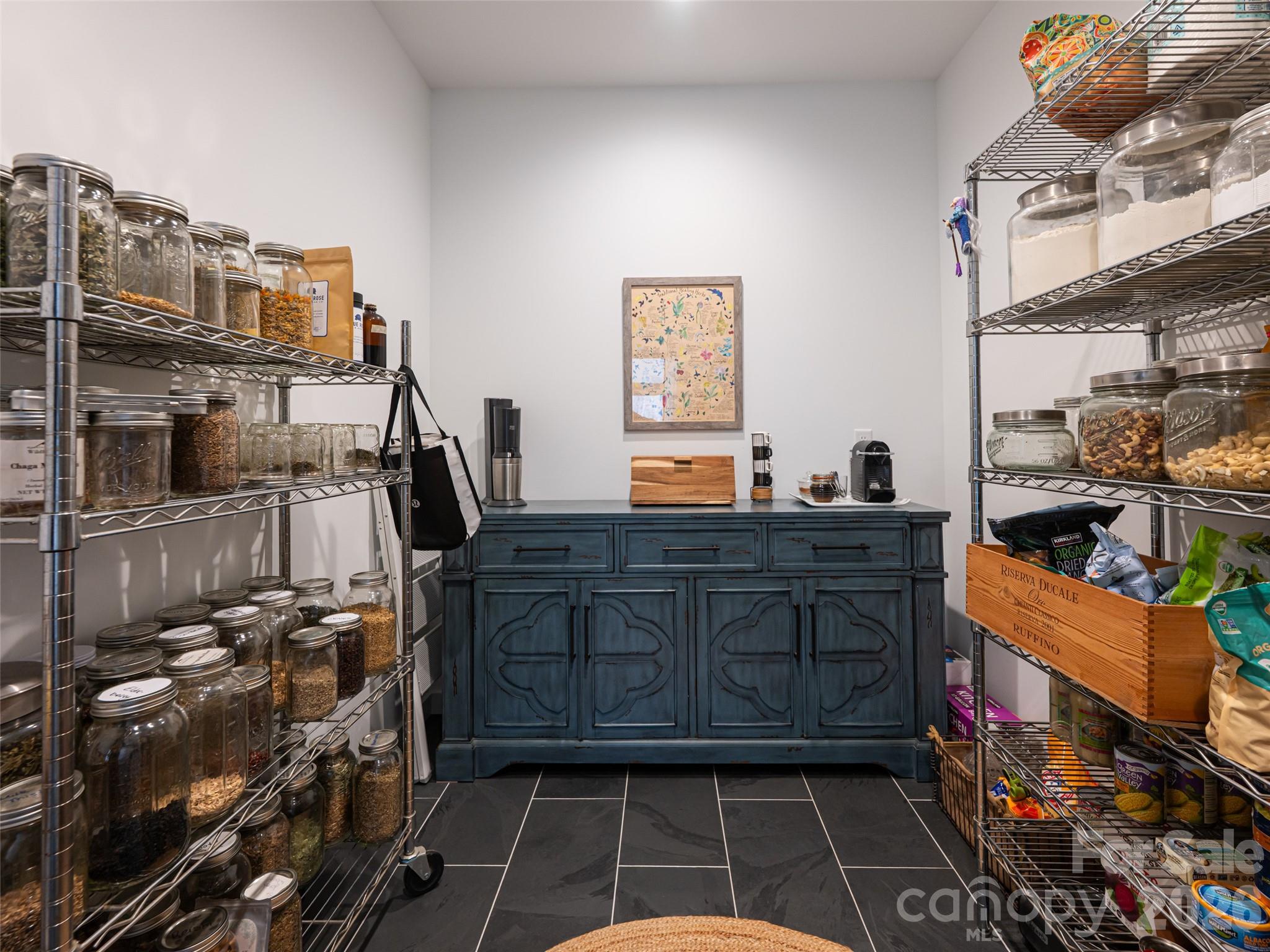 508 Avery Creek Road Arden, NC 28704 - Photo 22 of 47 a room with lots of different colored cloths