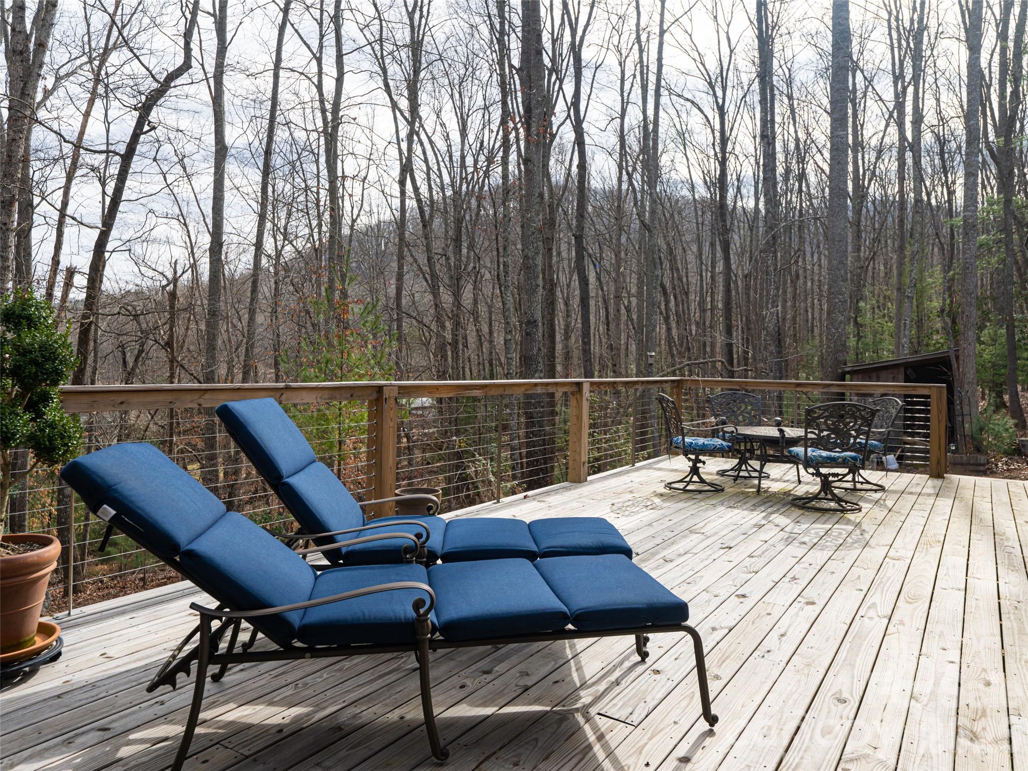 508 Avery Creek Road Arden, NC 28704 - Photo 25 of 47 a view of a chairs and table on the wooden floor