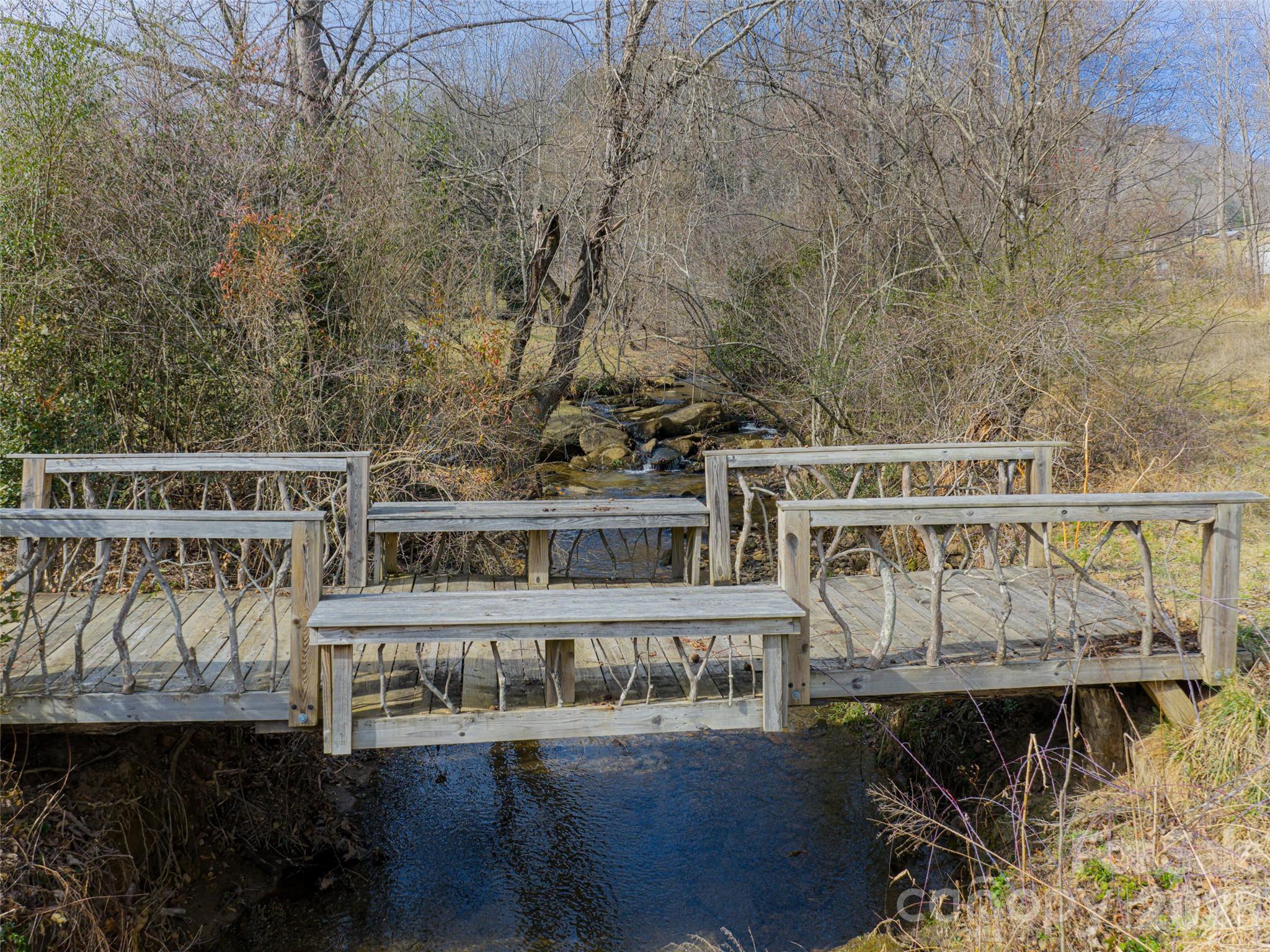 508 Avery Creek Road Arden, NC 28704 - Photo 41 of 47 a view of a roof deck with wooden floor and seating space