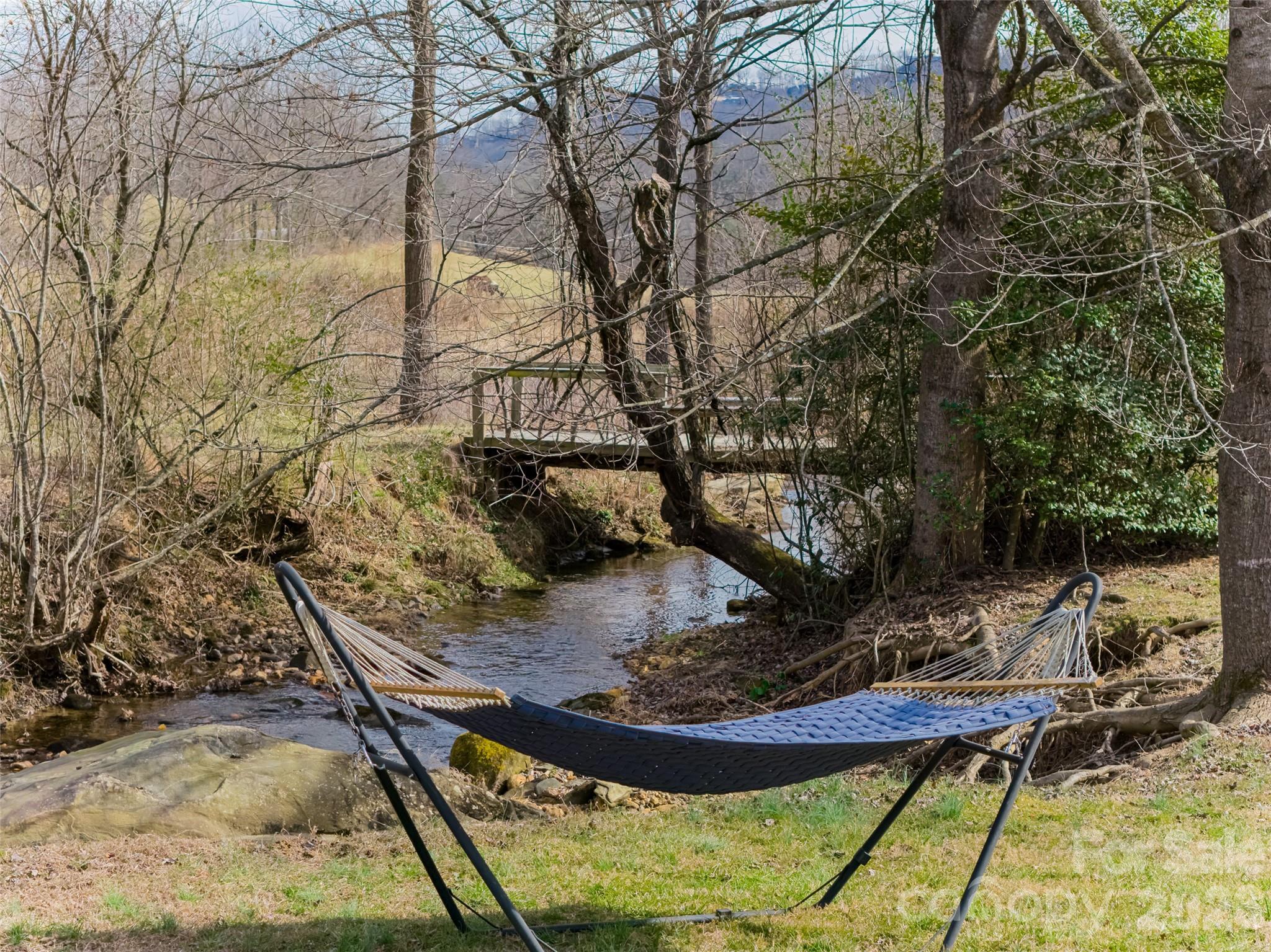 508 Avery Creek Road Arden, NC 28704 - Photo 42 of 47 a view of a backyard with sitting area