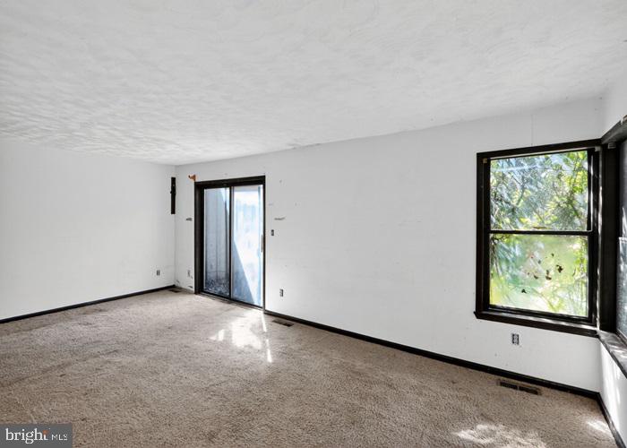 6320 Windpatterns Trail Fairfax Station, VA 22039 - Photo 13 of 21 an empty room with windows