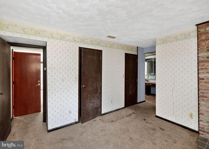 6320 Windpatterns Trail Fairfax Station, VA 22039 - Photo 17 of 21 an empty room with closet