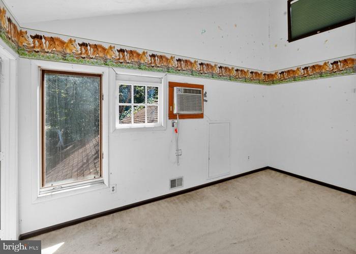 6320 Windpatterns Trail Fairfax Station, VA 22039 - Photo 10 of 21 a view of a room with wooden floor and cabinet