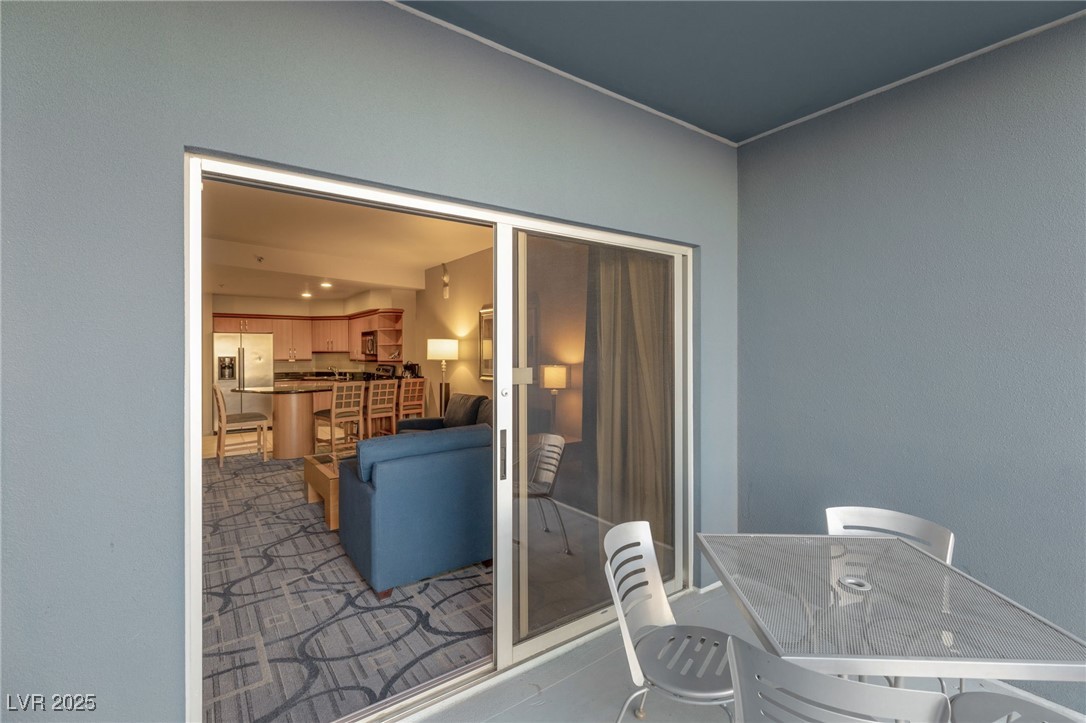 211 East Flamingo Road, Unit 610 Las Vegas, NV 89169 - Photo 21 of 42 View of patio / terrace featuring outdoor dining area