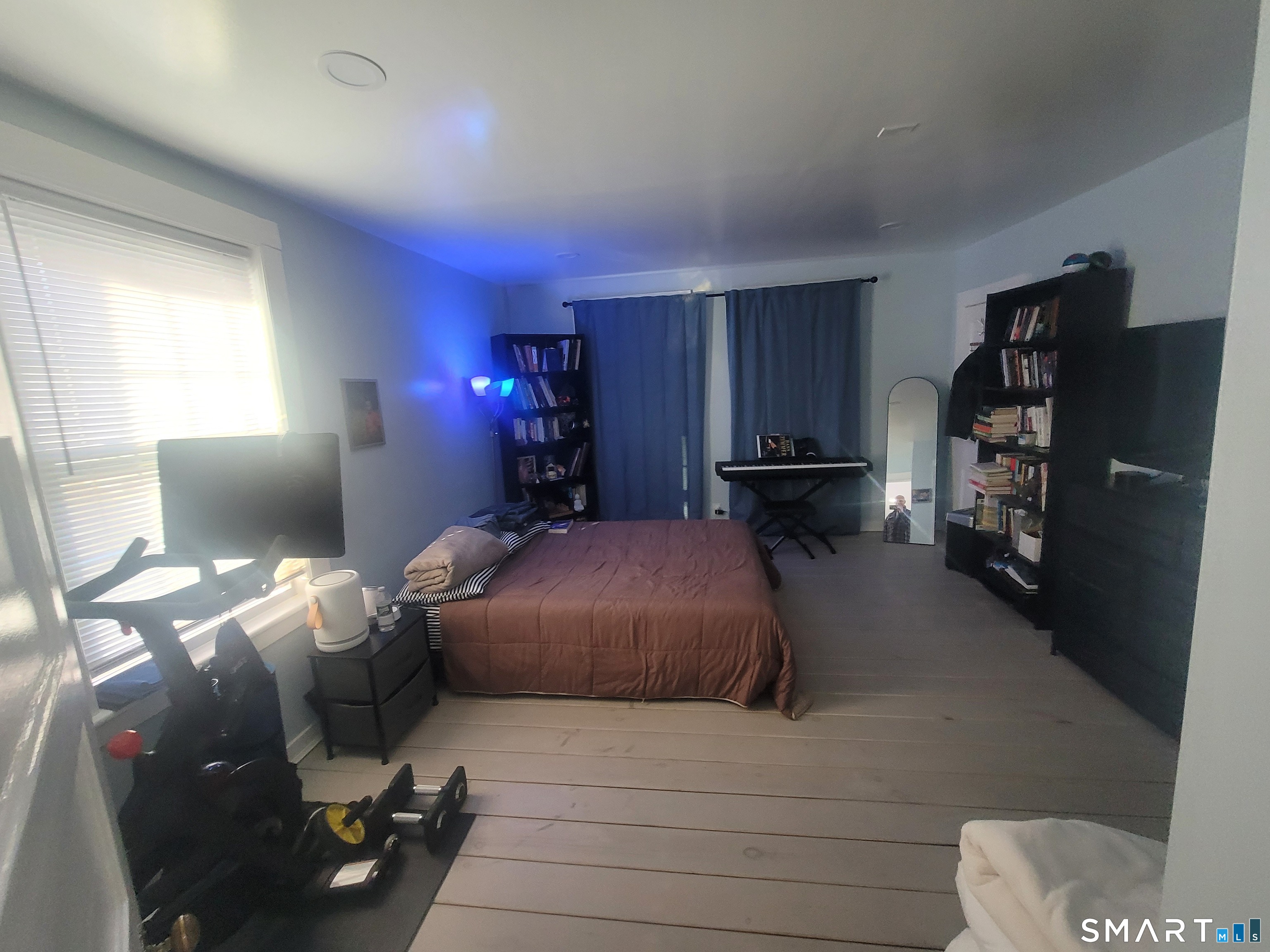 37 Biro Street Fairfield, CT 06825 - Photo 14 of 21 a bed room with a bed and furniture