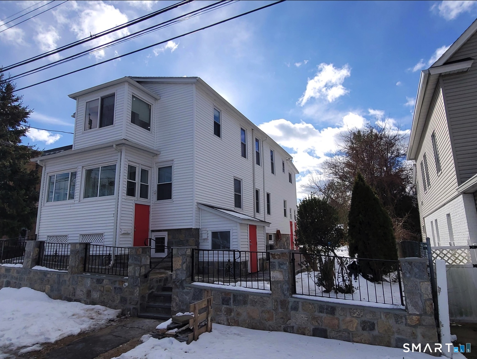 37 Biro Street Fairfield, CT 06825 - Photo 2 of 21 a view of a building with a street