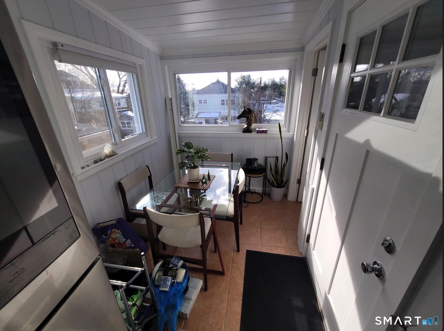 37 Biro Street Fairfield, CT 06825 - Photo 9 of 21 a view of a dining room with furniture window and outside view