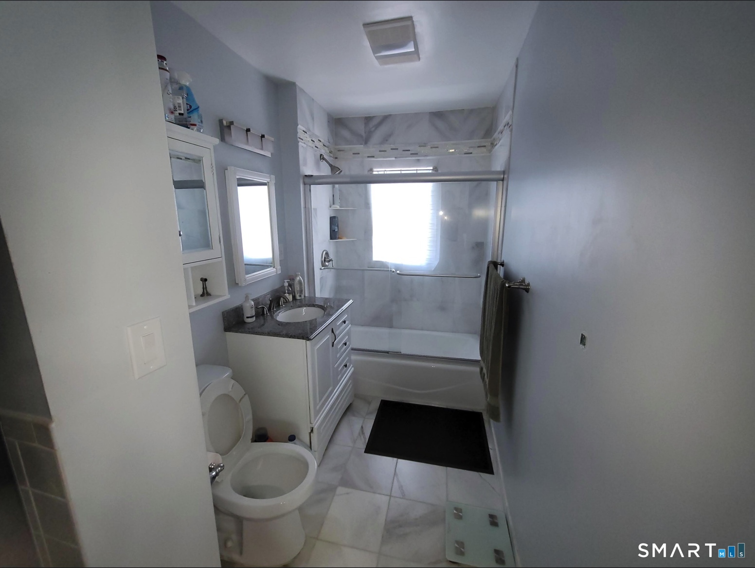 37 Biro Street Fairfield, CT 06825 - Photo 10 of 21 a bathroom with a toilet and a sink