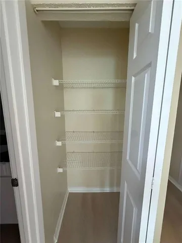 a bathroom with a glass door