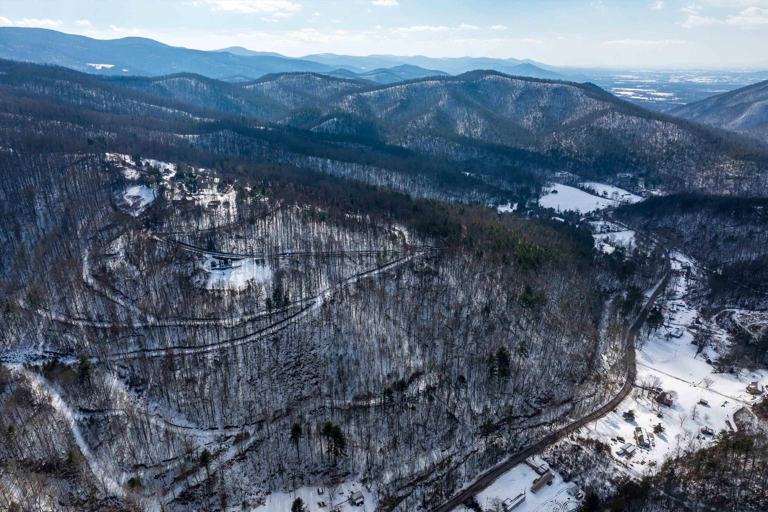 Lot 9 Overlook Mountain Road Elkton, VA 22827 - Photo 5 of 20 a view of a house with a backyard and a garden
