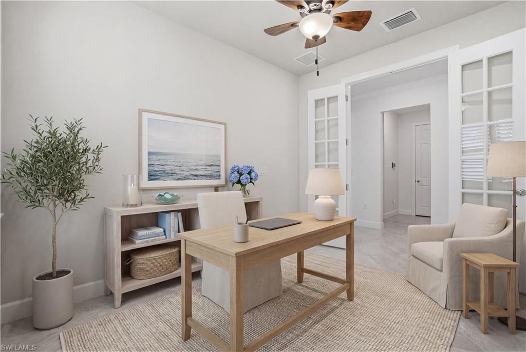 9395 Greyhawk Trail Naples, FL 34120 - Photo 19 of 37 a room with furniture and window