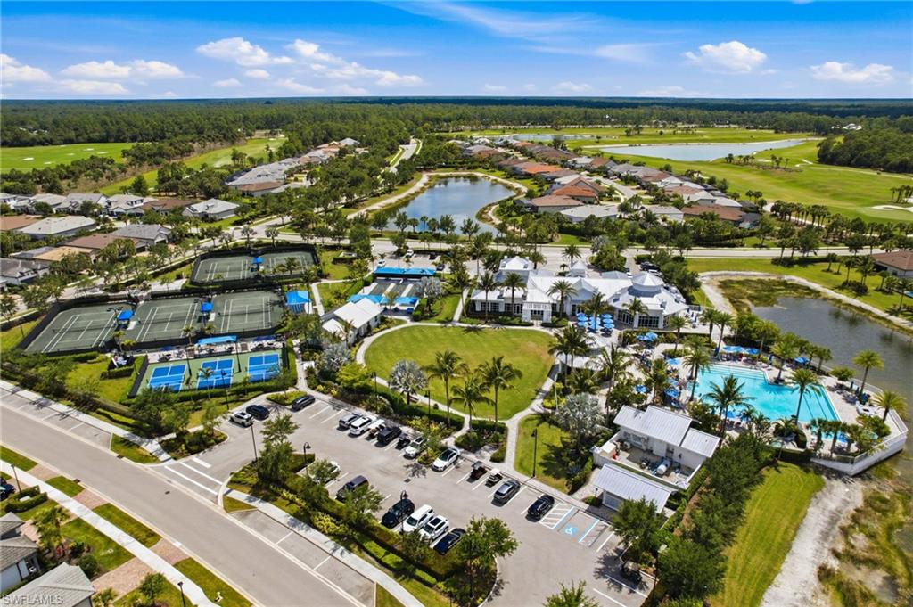 9395 Greyhawk Trail Naples, FL 34120 - Photo 3 of 37 an aerial view of residential houses with outdoor space