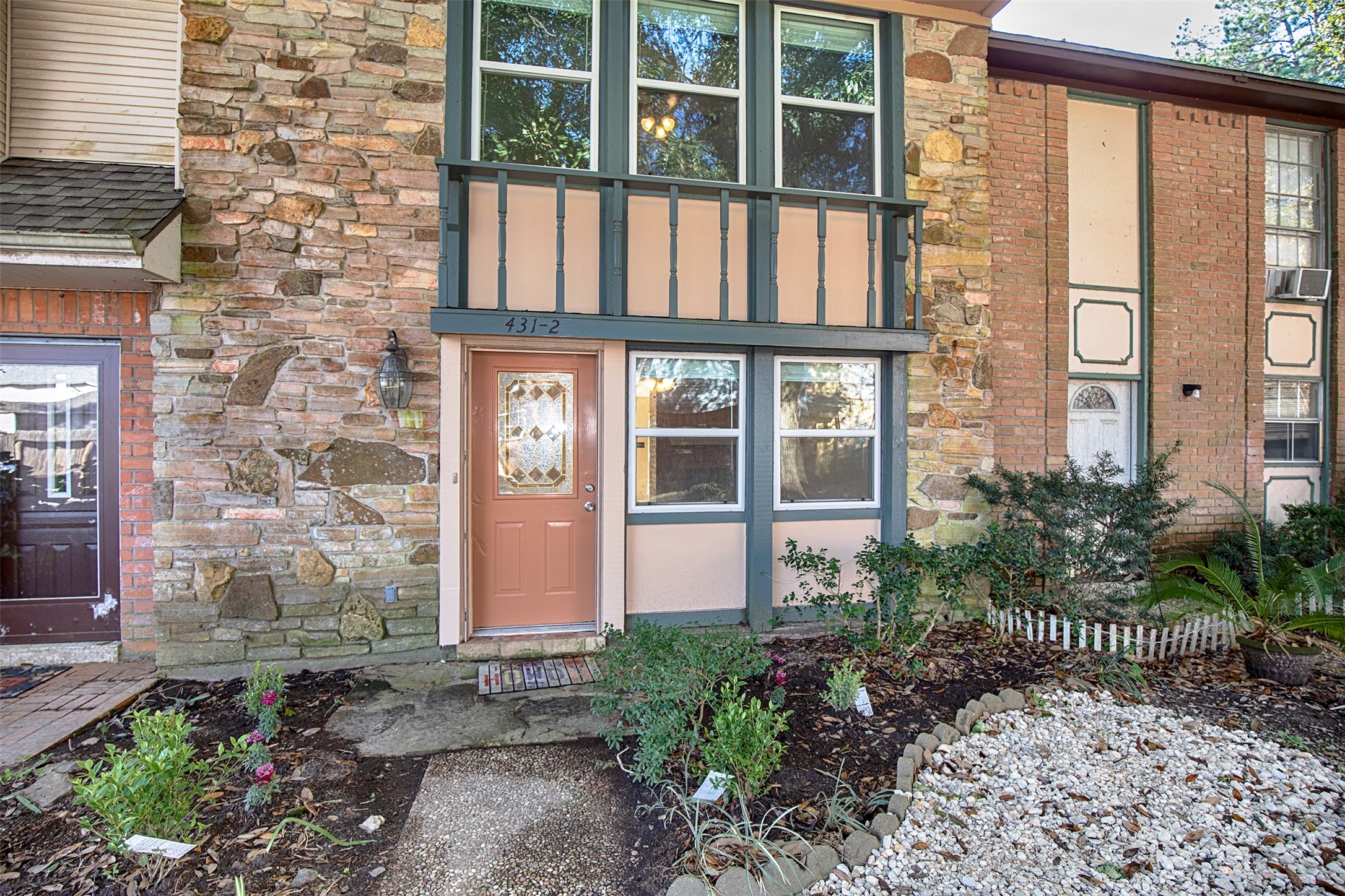 a house view with a garden space