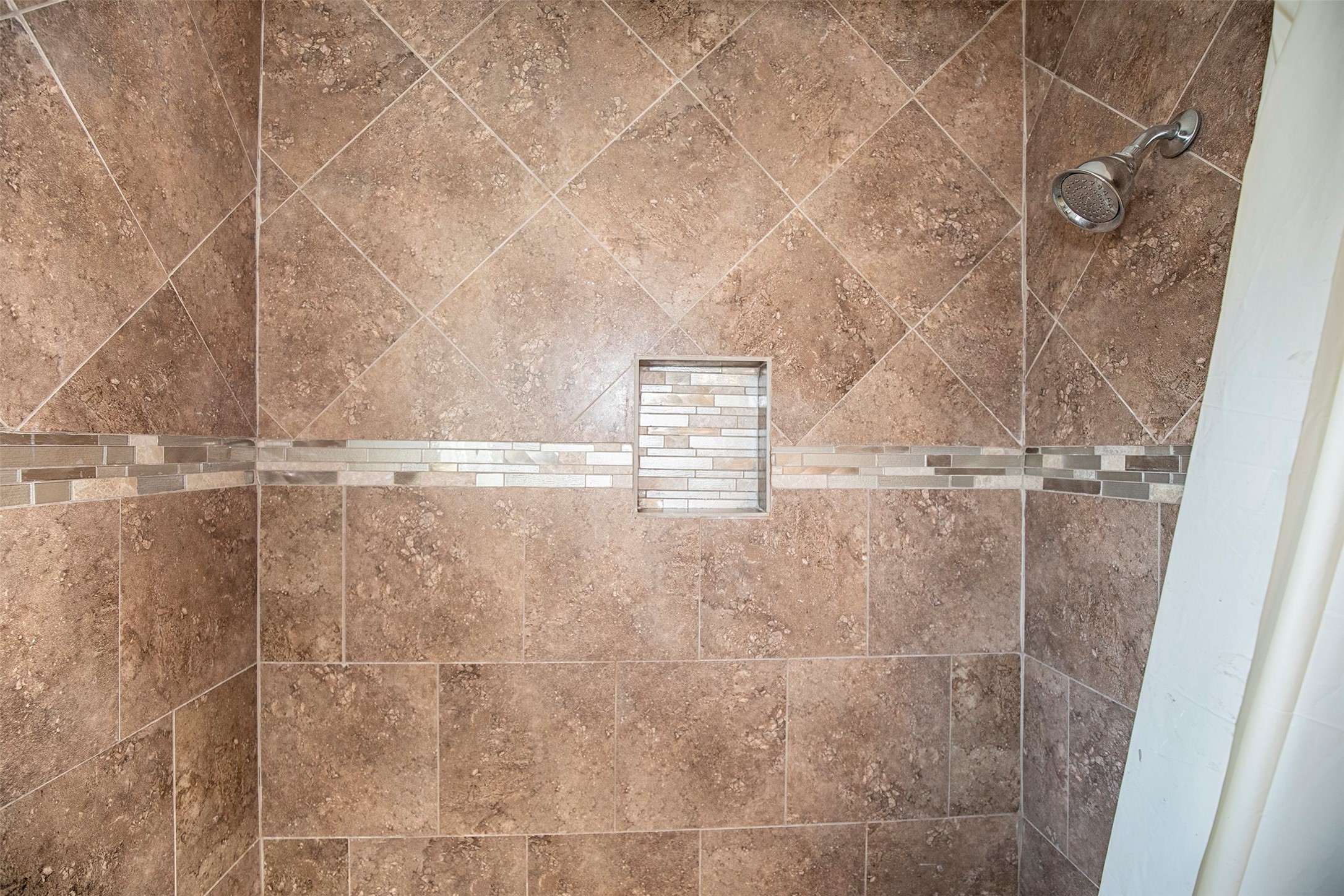 431 Sunset Drive, Unit 2 Dickinson, TX 77539 - Photo 14 of 25 a bathroom with a shower