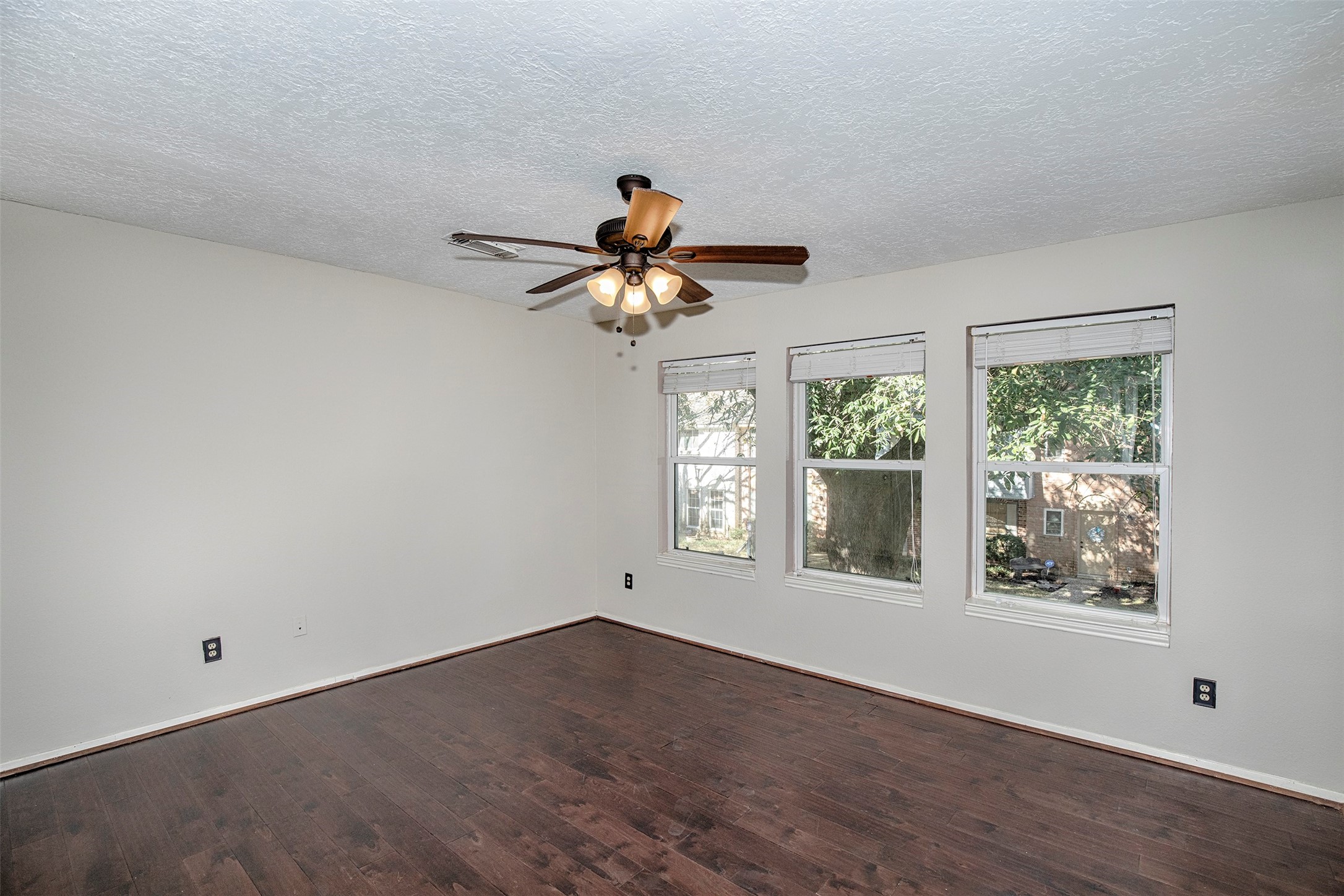431 Sunset Drive, Unit 2 Dickinson, TX 77539 - Photo 16 of 25 a view of an empty room with a window