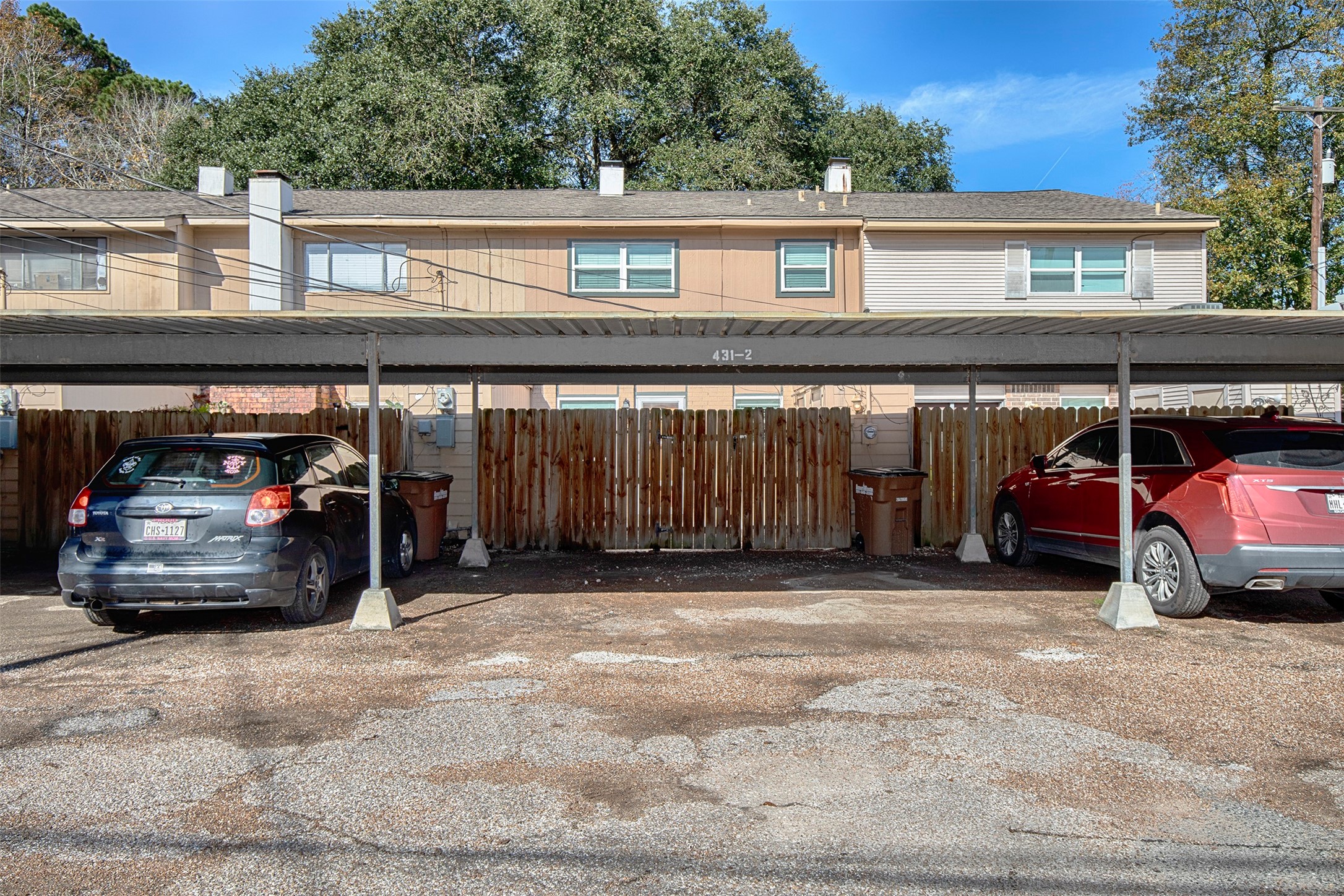 431 Sunset Drive, Unit 2 Dickinson, TX 77539 - Photo 20 of 25 a car parked in front of a building