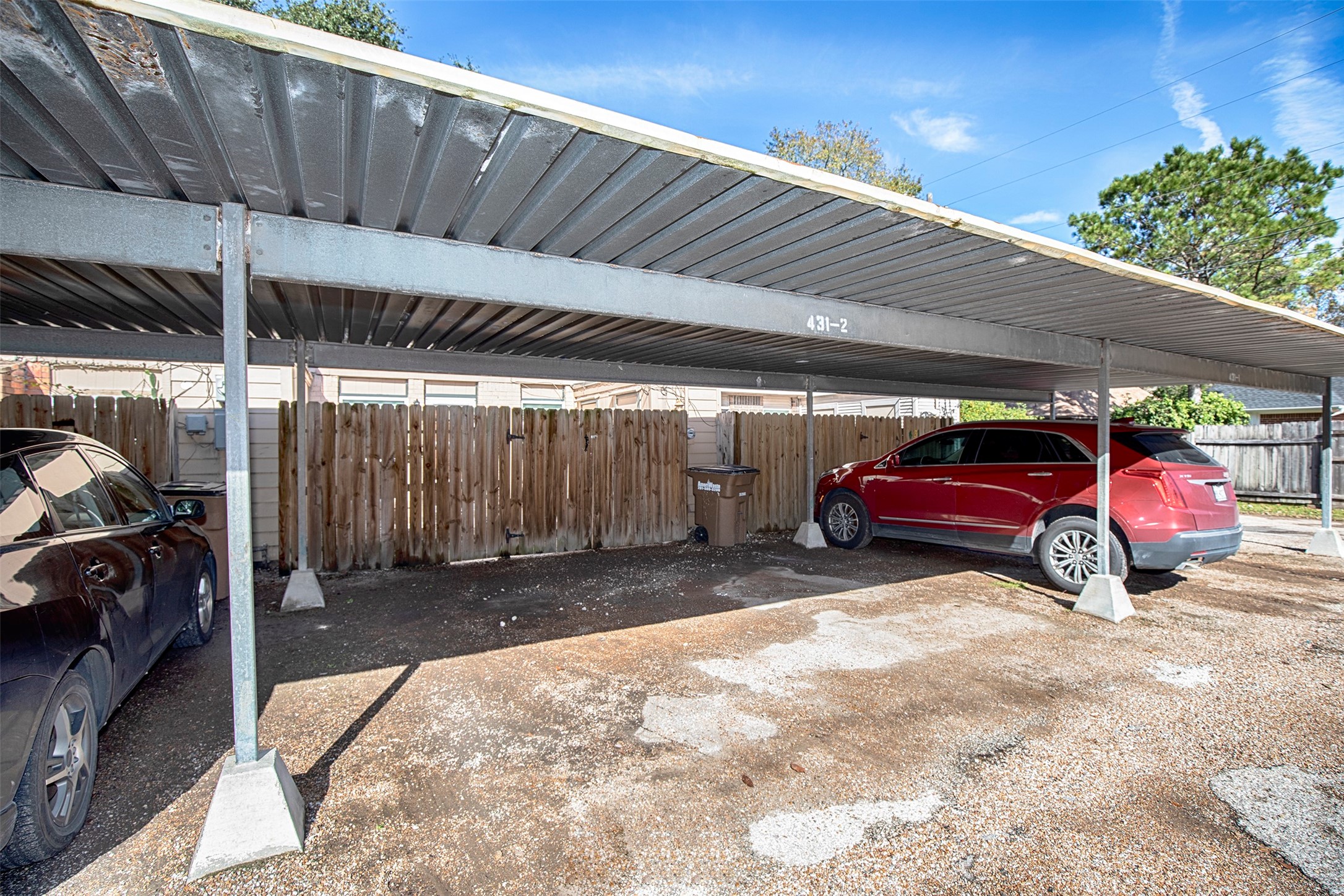 431 Sunset Drive, Unit 2 Dickinson, TX 77539 - Photo 21 of 25 a view of a cars parking space