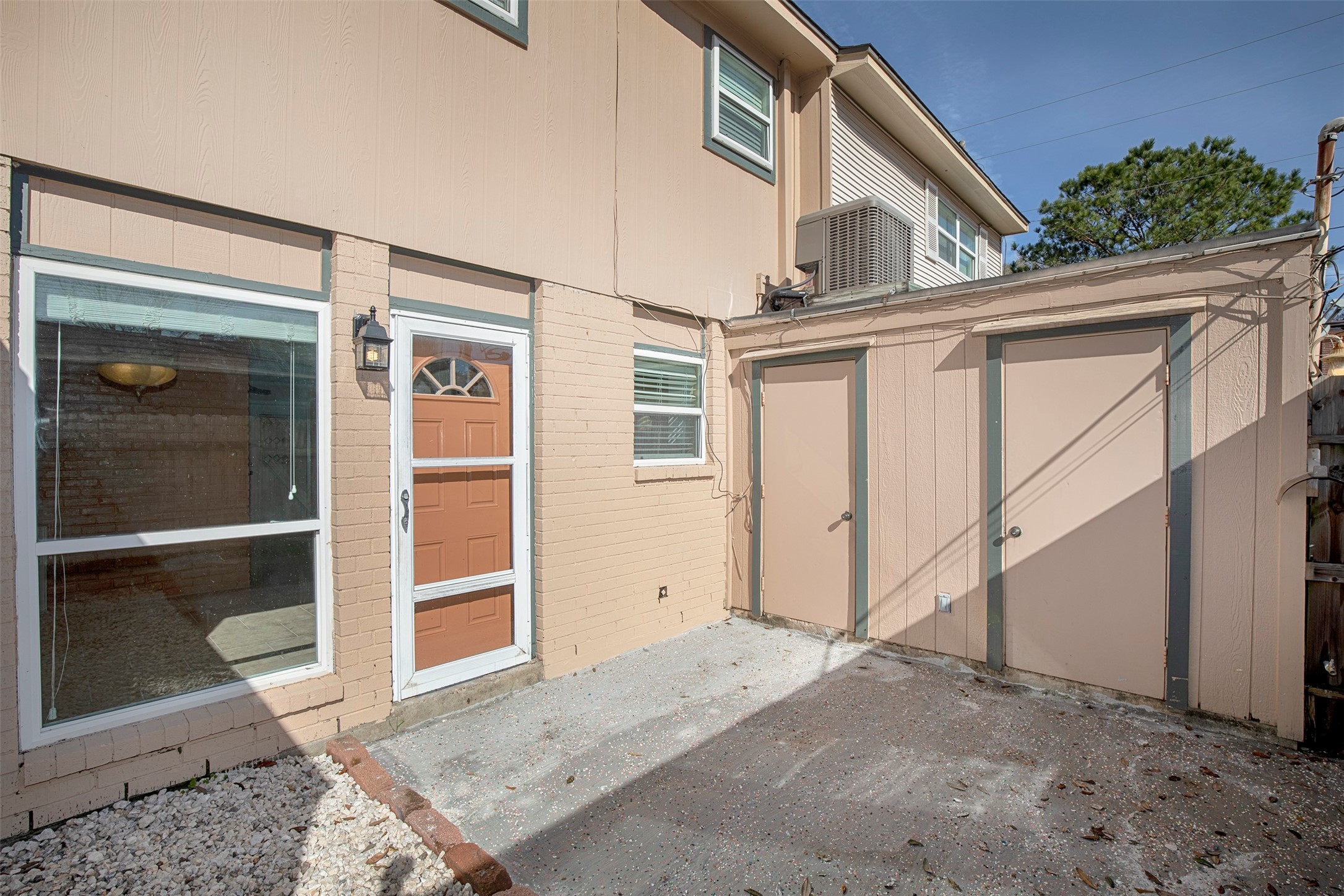 431 Sunset Drive, Unit 2 Dickinson, TX 77539 - Photo 22 of 25 a house view with a outdoor space