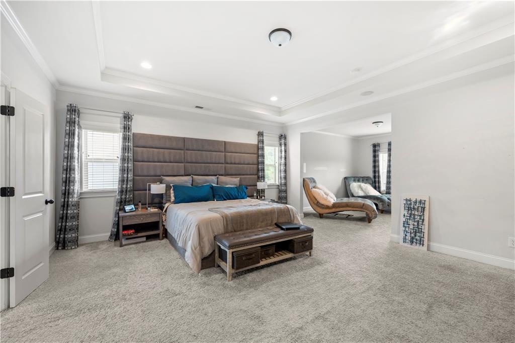 130 Sycamore Row Atlanta, GA 30331 - Photo 25 of 42 a spacious bedroom with a bed and furniture