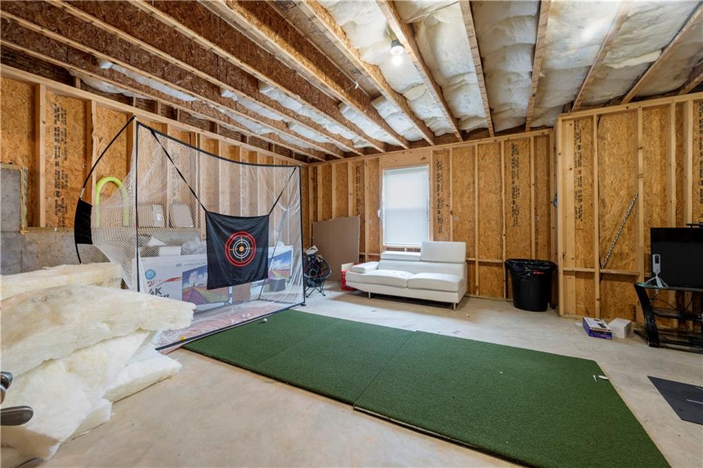 130 Sycamore Row Atlanta, GA 30331 - Photo 31 of 42 a living room with furniture and a fireplace