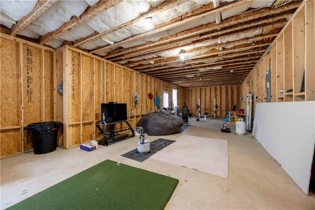 130 Sycamore Row Atlanta, GA 30331 - Photo 32 of 42 a view of a patio with table and chairs