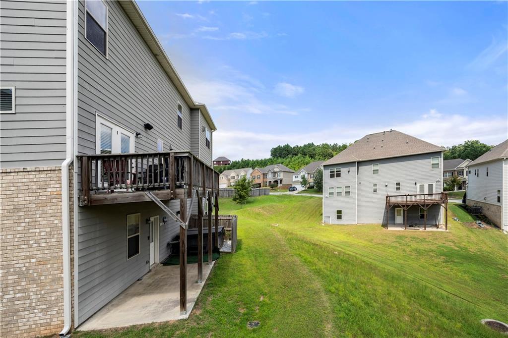 130 Sycamore Row Atlanta, GA 30331 - Photo 36 of 42 a view of house with backyard and furniture