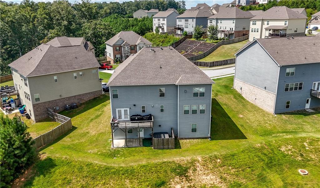 130 Sycamore Row Atlanta, GA 30331 - Photo 39 of 42 a aerial view of a house with swimming pool and a yard