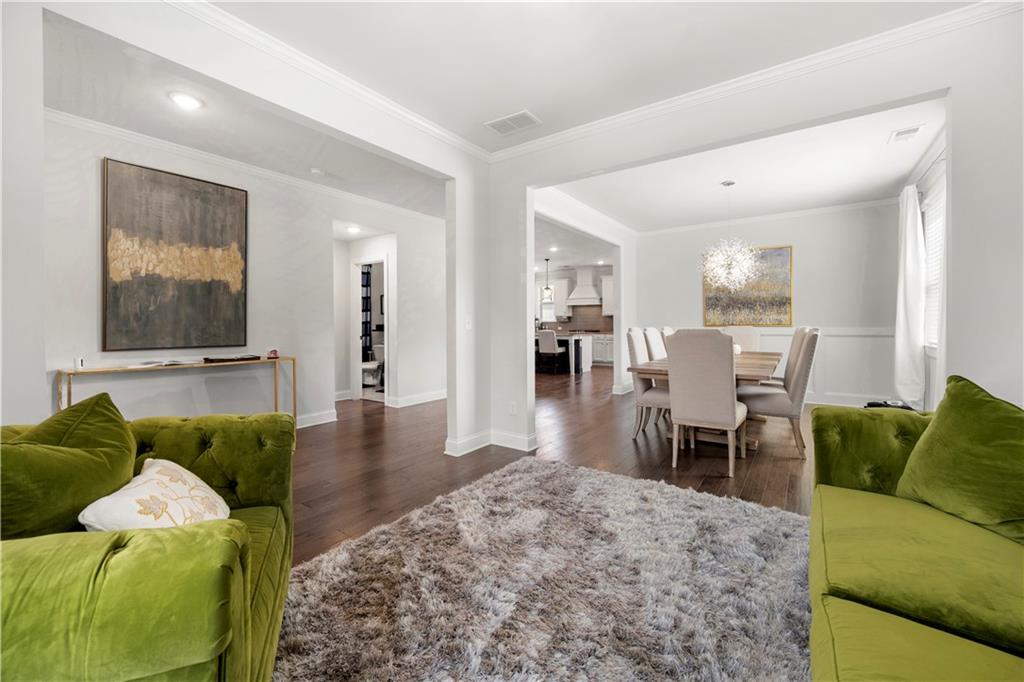 130 Sycamore Row Atlanta, GA 30331 - Photo 6 of 42 a living room with furniture and a wooden floor