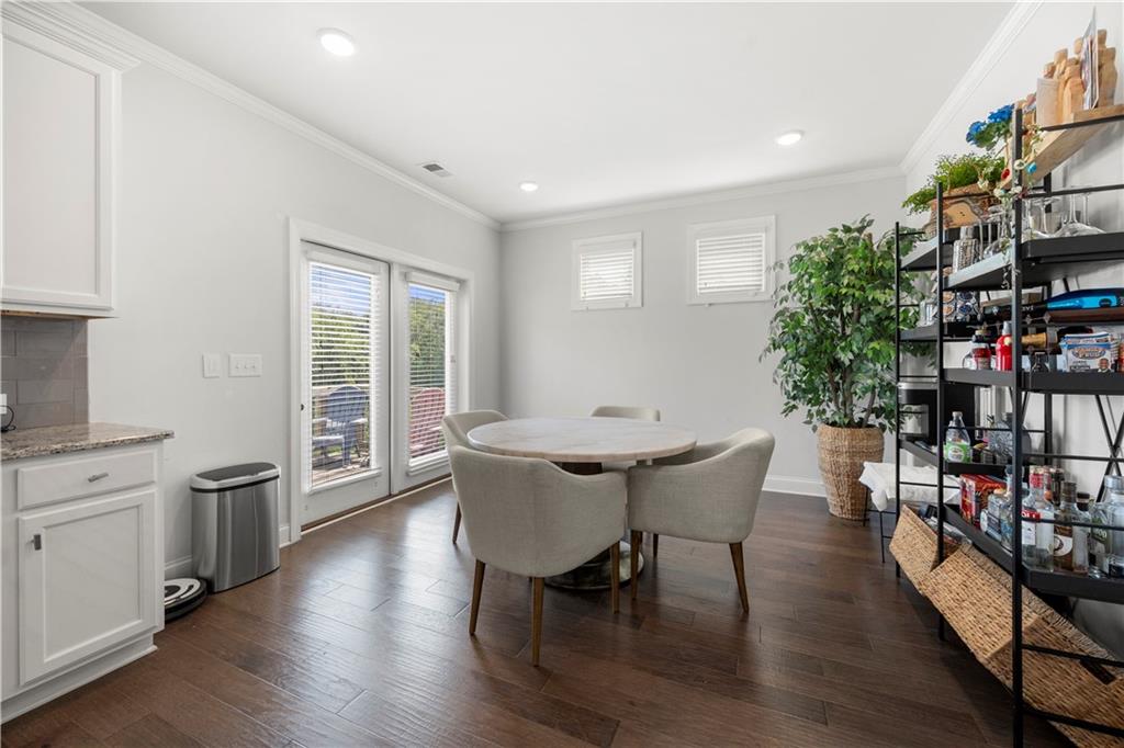 130 Sycamore Row Atlanta, GA 30331 - Photo 10 of 42 a dining room with furniture and wooden floor