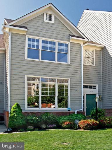 1277 Weatherstone Court Reston, VA 20194 - Photo 1 of 1 a front view of a house with a yard and plants