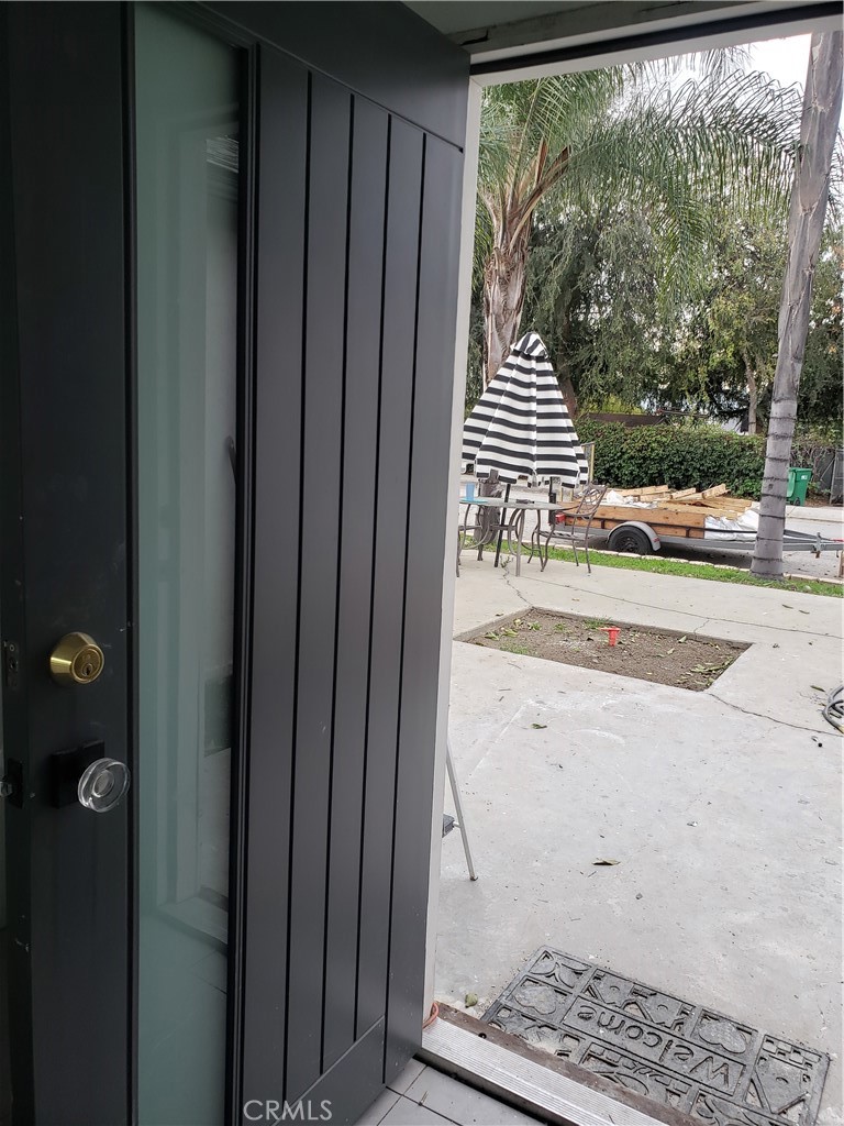 13185 14th Street Chino, CA 91710 - Photo 18 of 42 a view of a entryway door of the house