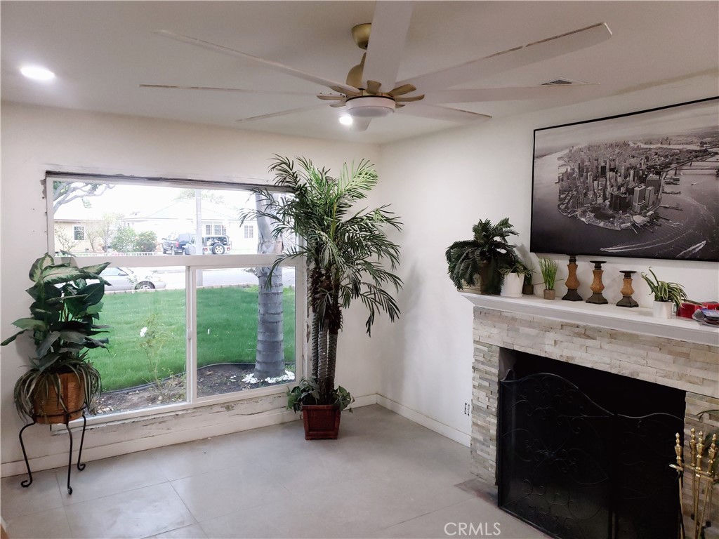 13185 14th Street Chino, CA 91710 - Photo 27 of 42 a living room with furniture and a fireplace