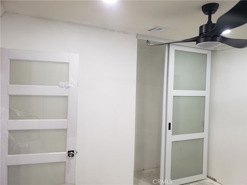 13185 14th Street Chino, CA 91710 - Photo 32 of 42 a view of an empty walk in closet