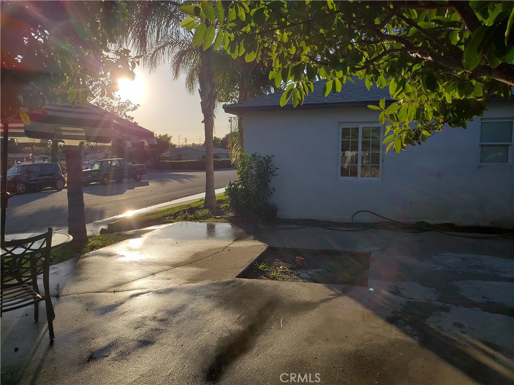 13185 14th Street Chino, CA 91710 - Photo 5 of 42 a backyard of a house with wooden floor