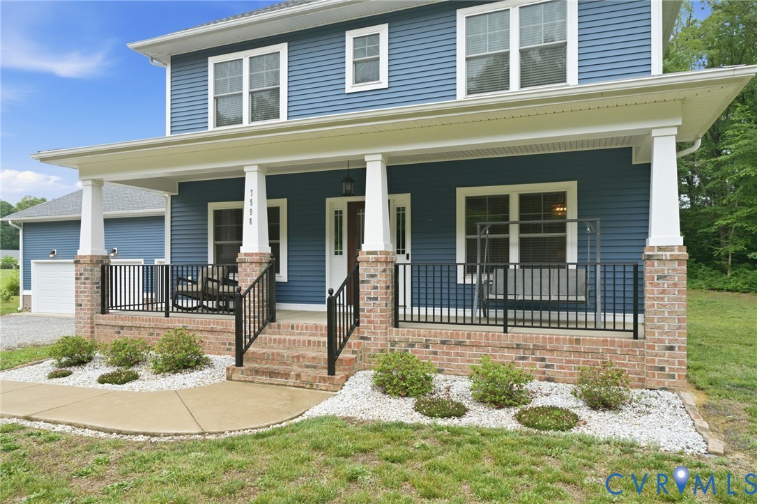 7598 Rural Point Road Mechanicsville, VA 23116 - Photo 2 of 41 a house view with a outdoor space