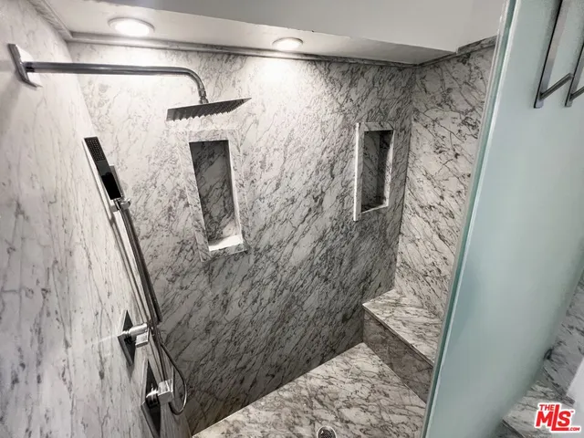 a view of a patio with a table chairs and a table