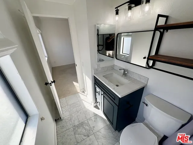 a view of a patio with a yard