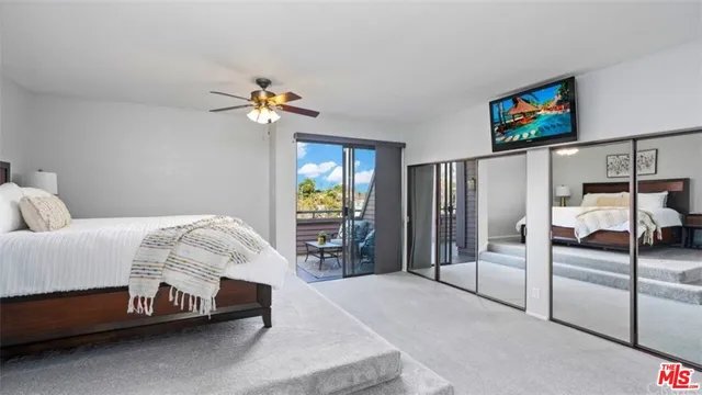 a bathroom with a shower and a sink
