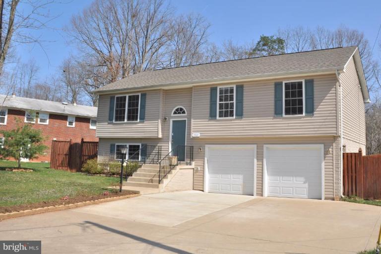 7401 Bull Run Road Manassas, VA 20111 - Photo 1 of 22 a front view of a house with a yard