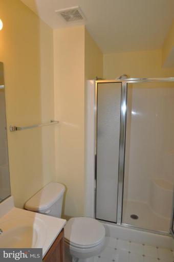 7401 Bull Run Road Manassas, VA 20111 - Photo 13 of 22 a bathroom with a toilet and a shower