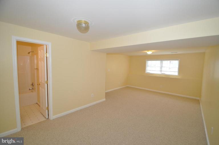 7401 Bull Run Road Manassas, VA 20111 - Photo 18 of 22 a view of an empty room and window