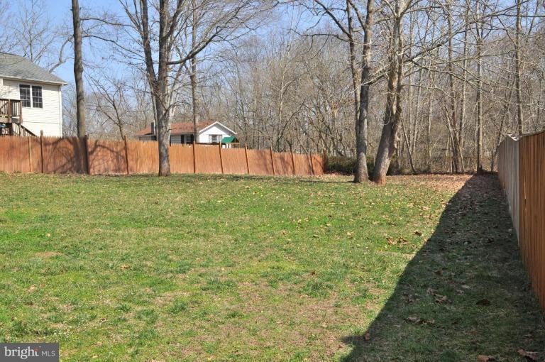 7401 Bull Run Road Manassas, VA 20111 - Photo 4 of 22 a view of a yard with large trees