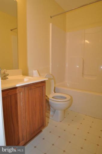 7401 Bull Run Road Manassas, VA 20111 - Photo 10 of 22 a bathroom with a sink a toilet and shower