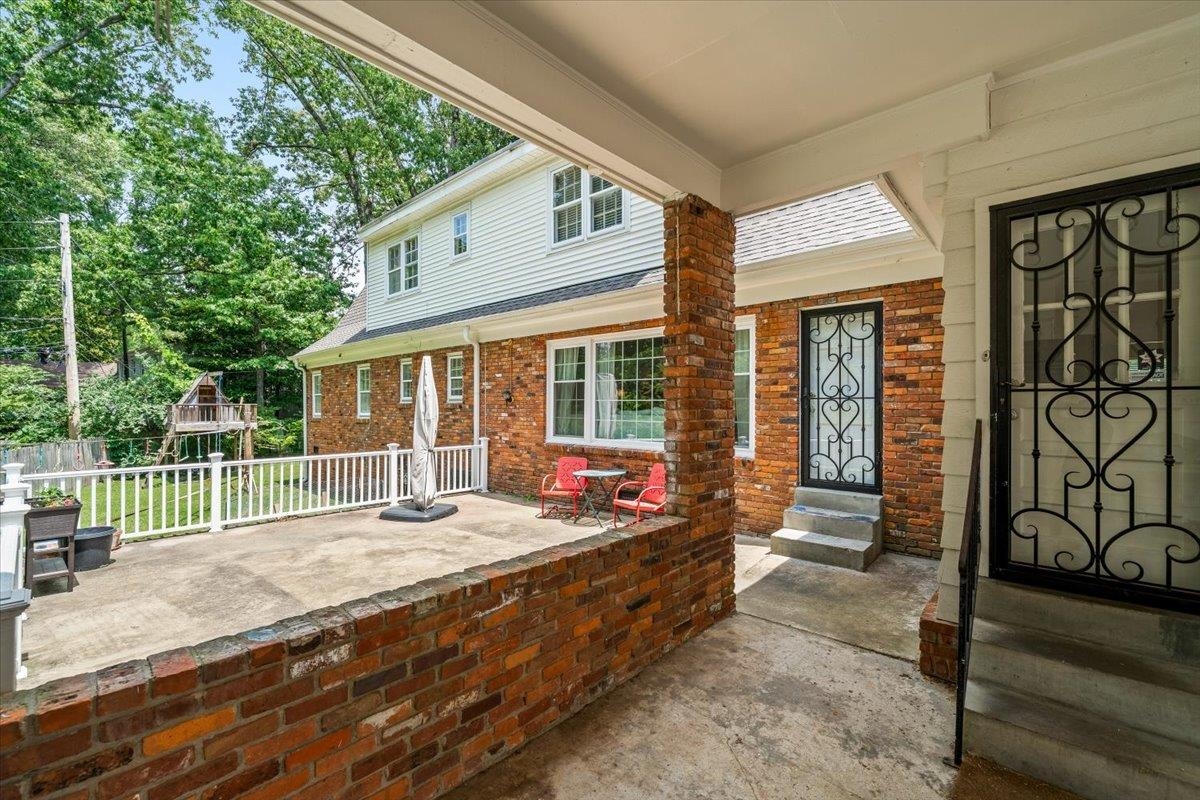 1273 Brookfield Road Memphis, TN 38119 - Photo 33 of 40 Brick exterior with white siding accents and multiple windows